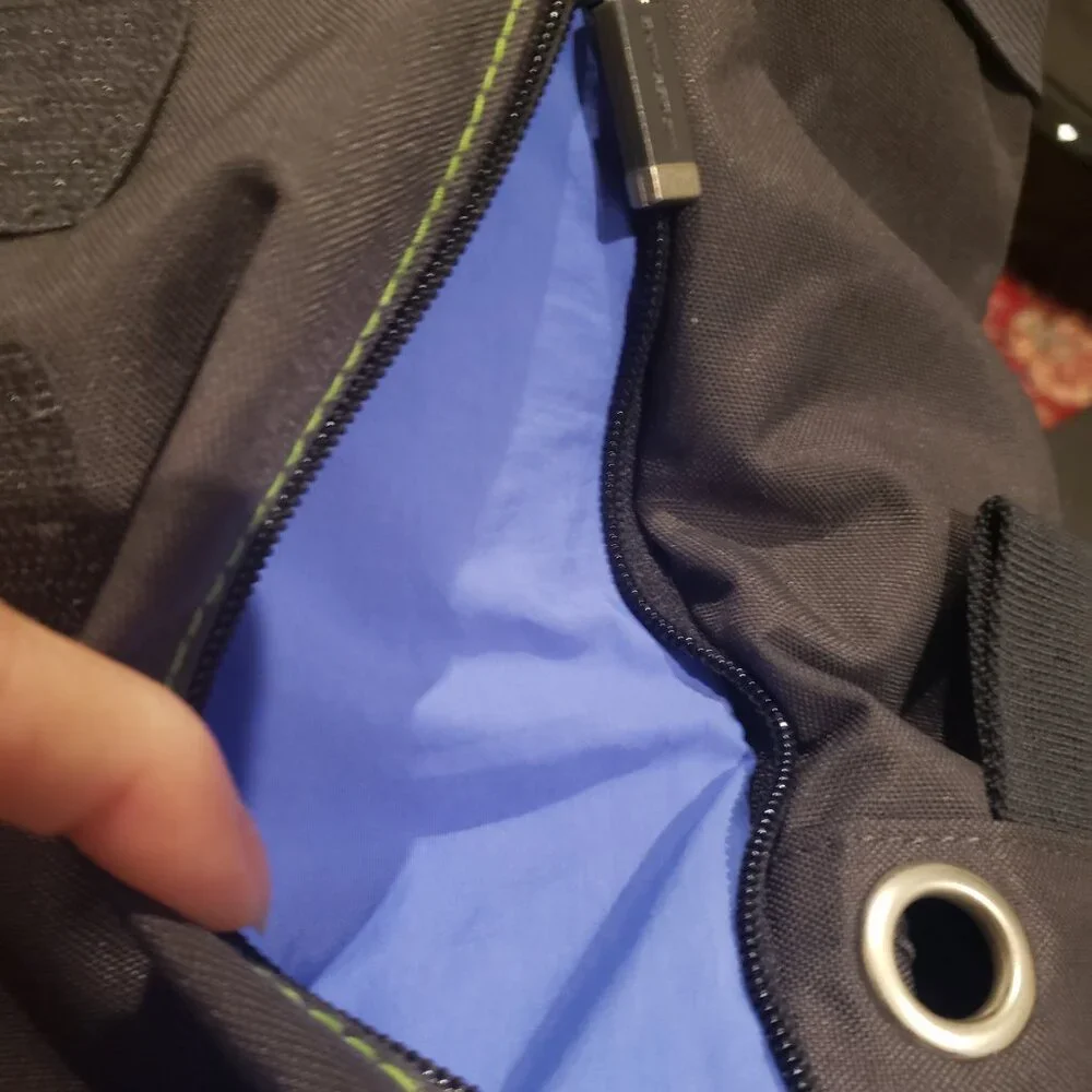 Moleskine Messenger Backpack Computer Bag. Black with Blue and Green Interior